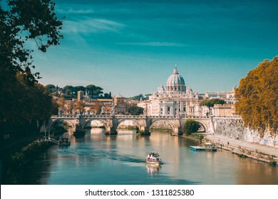 Rome, Italy. Papal Basilica Of St. Peter In The Vatican. Sightseeing Boat Floating Near Aelian Bridge. Tour Touristic Boat - Powered by Shutterstock