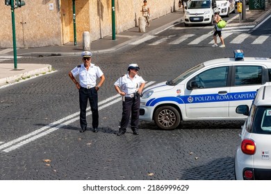 ROME, ITALY - Sep 16, 2018: Two Policemen Standing At A Traffic Incident Site In Rome, Italy