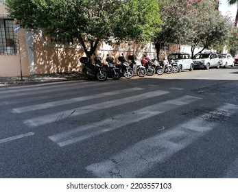 Rome, Italy - September 15, 2022, A Moped Parking Lot With Pedestrian Crossing Along An Urban Street In The Parioli Area.