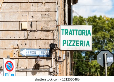 Rome, Italy - September 4, 2018: Italian Restaurant Trattoria Pizzeria Sign Closeup Outside, Nobody Street Cafe In Historic City Street, Senso Unico