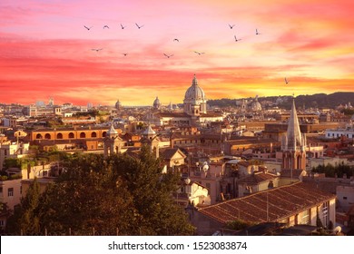Rome, Italy at sunset. Cityscape with amazing pastel colours sky and nice view of the city with church basilicas domes.                  