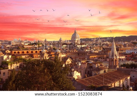 Rome, Italy at sunset. Cityscape with amazing pastel colours sky and nice view of the city with church basilicas domes.                  