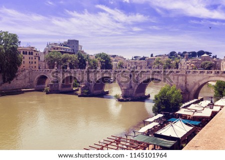 Rome Italy. View of famous Sant Angelo Bridge. River Tiber.