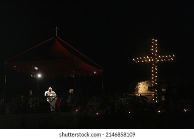 ROME, ITALY-15.04.2022:pope francis celebrates the ritual of the via crucis way of the cross, in the square of the colosseum in front of 10,000 faithful, after three years of absence due to a pandemic