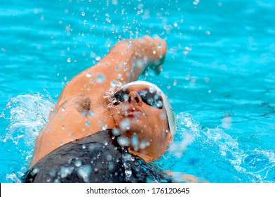 ROME, ITALY-JUNE 13, 2006: Professional swimmer man competes on a backstroke race during the International Swimming Race "Trofeo Settecolli" in Rome.