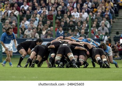 ROME, ITALY-NOVEMBER 13, 2004: All Blacks Rugby Players Scrum In Action During The Rugby Test Match Italy Vs New Zealand, In Rome.