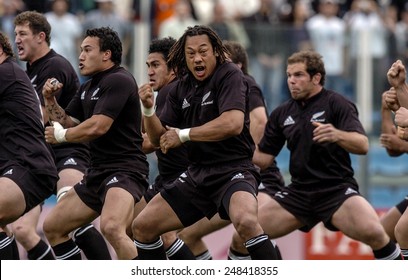 ROME, ITALY-NOVEMBER 13, 2004: new zealand rugby team players All Blacks performing the haka, maori traditional war dance, before the rugby test match Italy vs New Zealand, in Rome.