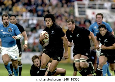 ROME, ITALY-NOVEMBER 13, 2004: new zealand rugby team players All Blacks performing the haka, maori traditional war dance, before the rugby test match Italy vs New Zealand, in Rome.