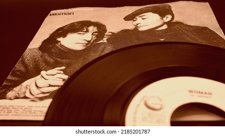 Rome, November 16, 2019: Cover And 45 Rpm Of The Single WOMAN By John Lennon From 1981. He Hears His Wife Yoko Ono And The First Posthumous Release After Lennon's Death On December 8th 1980