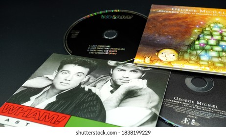 Rome, October 21, 2020: CDs And Artwork Of Two Christmas Singles By GEORGE MICHAEL. The Single LAST CHRISTMAS Is The 10th Best-selling Single Of All Time In The UK