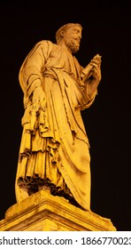 Rome - The Statue Saint Peter Holding The Keys On The Angels Bridge At Night By Il Lorenzetto (1534). 