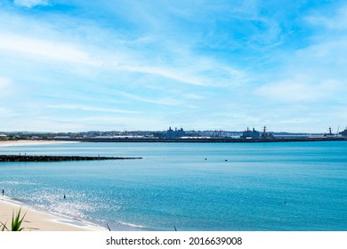 Rompidillo Beach With The Naval Base In The Background In Rota, Cadiz, Andalusia, Spain