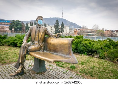 Ronald Reagan Statue In Rike Park With Medical Face Mask During Pandemic. Concept Of Corona Virus Pandemic And Social Life.Tbilisi.Georgia.25.03.2020