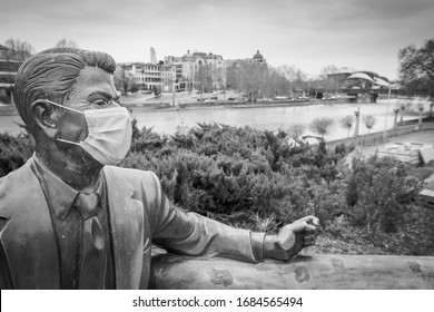 Ronald Reagan Statue In Rike Park With Medical Face Mask During Pandemic. Concept Of Corona Virus Pandem And People.Tbilisi. Georgia.25.03.2020