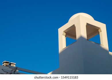 roof of beach apartment bathed by sunset sun - Shutterstock ID 1549115183