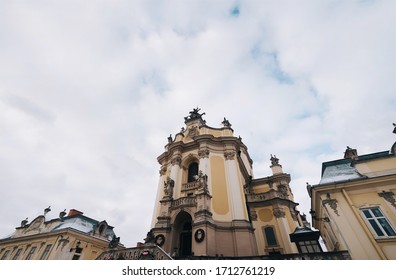 The Roof Of The Cathedral Of St. George In Lviv. Sculpture Of A Horseman With A Spear On A Horse. Rococo Style, Greek Catholic Shrine. Wide Angle.