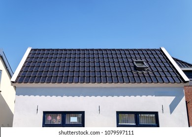 Roof Covered With Small Solar Panel Roof Tiles