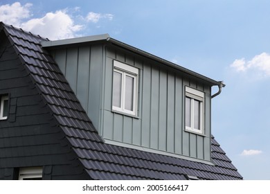 Roof dormer with stainless steel cladding