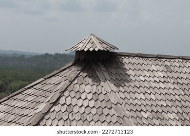 The roof of the house with a modern classic design of wood that is arranged neatly and tightly with a unique shape - Shutterstock ID 2272713123