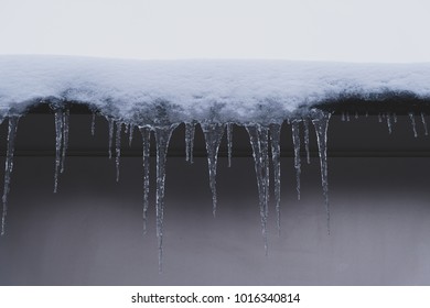 Roof With Ice Dams In Winter Time. Winter Concept. Takayama, Japan.