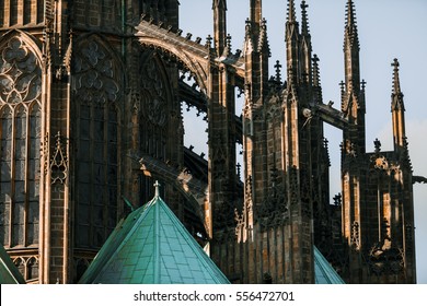 Roof line with flying buttresses on the gothic St Vitus Cathedral in the Prague Castle Complex - Shutterstock ID 556472701