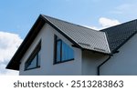 The roof of a newly built private house on a sunny day