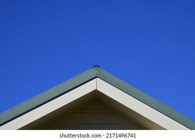 Roof Peak In Blue Background