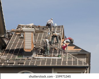 Roof Repairs Of An Apartment Building In Colorado.
