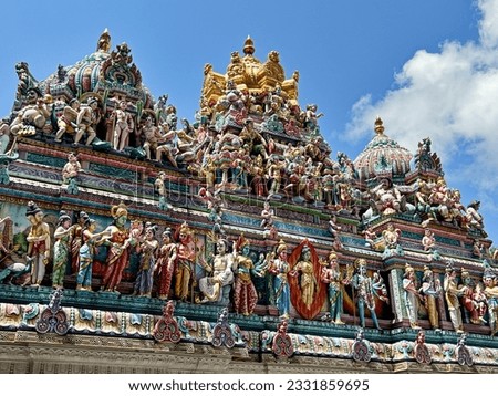 The roof of the Sri Veeramakaliamman Temple is covered with hundreds of colorful Hindu gods and goddesses.