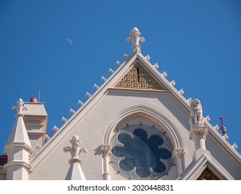 Roof styling on Parliamentary Library in Wellington, South Island, New Zealand, with moon in background