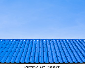 Roof Top With Blue Tiles On The Blue Sky Background