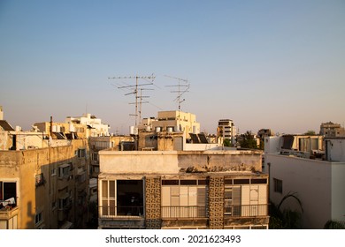 Roof top view in poor area of Tel Aviv. South Tel Aviv style of living. Old dirty buildings with boilers.