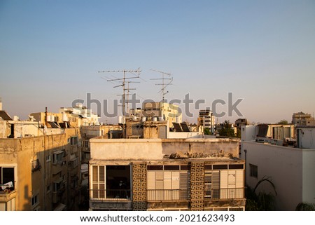 Roof top view in poor area of Tel Aviv. South Tel Aviv style of living. Old dirty buildings with boilers.
