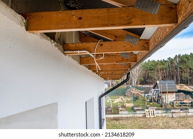 Roof Trusses Through Which The Electric Cable Passes To Connect The Lighting In The Soffit.