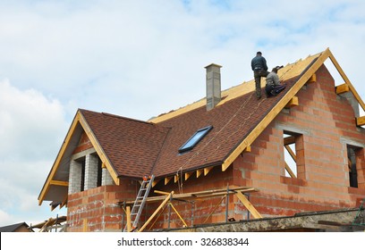 Roofing Construction And Building New Brick House With Modular Chimney, Skylights, Attic, Dormers And Eaves. 