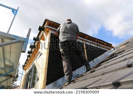 Roofing contractor working on a new dormer ストックフォト © 