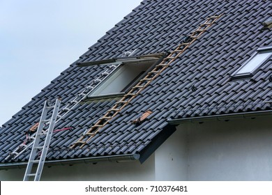 Roofing, Installation Or Repair Of A Roof Window On A Pitched Roof