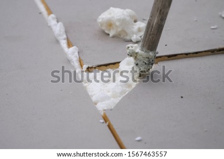 Roofing insulation, installation of insulation sheets on foam. Foam and insulation.