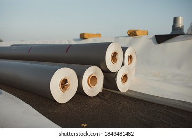 Roofing PVC Membrane In Rolls Placed On The Roof Of A Hall.Rubber Membrane Ready To Be Mounted.