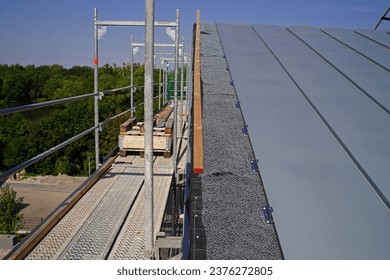 Roofing of terraced houses with standing seam roofing