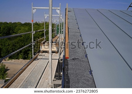 Roofing of terraced houses with standing seam roofing