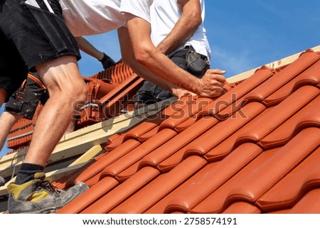 Roofing work, new covering of a tiled roof