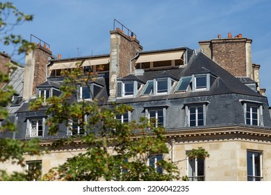 Roofs of a house in Paris close-up on a sunny day. - Shutterstock ID 2206042235