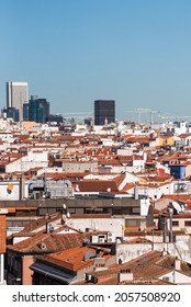 Roofs of houses in Madrid, near Paseo de la Castellana, in vertical format
