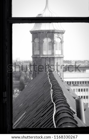 Rooftop angles taken through a window at the top of The Round Tower, Copenhagen, Denmark