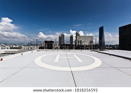 Rooftop of building with heliport mark