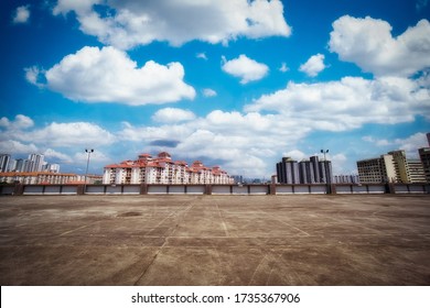 Rooftop Car Park With Urban City View