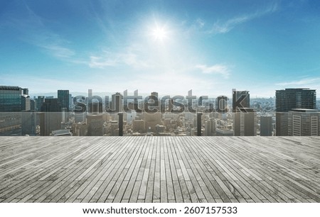 Rooftop empty brick floor with panoramic city skyline.