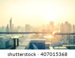 Rooftop party concept: Blurred dining table restaurant with beautiful city view at twilight scene background. Bangkok, Thailand, Asia