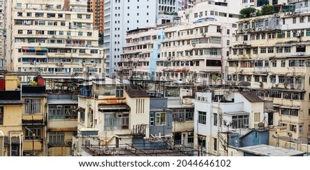 Rooftop slums (houses) and old buildings of Causeway Bay, Hong Kong where residential apartments are highly packed